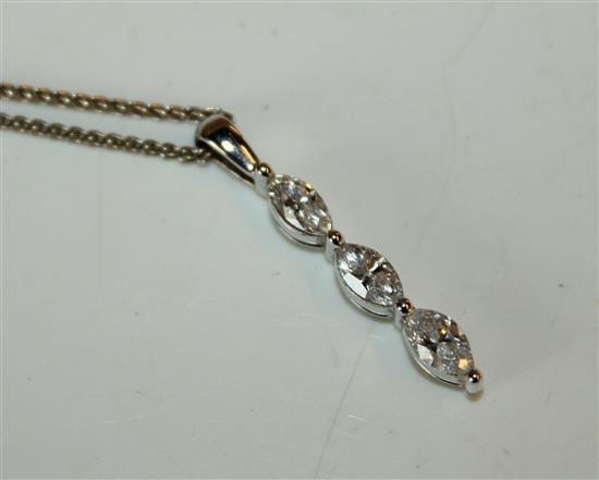 18ct white gold and three stone diamond pendant on chain(-)